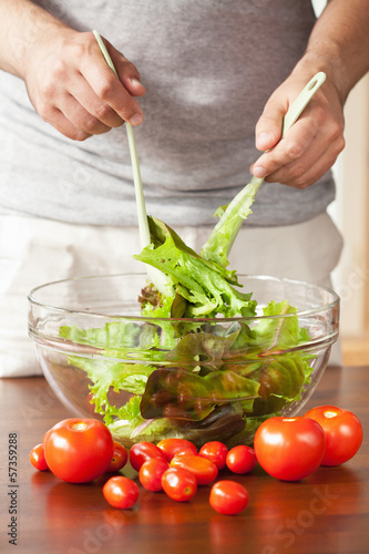 Photo: man preparing salad man preparing salad
