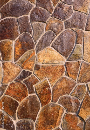 Photo: Fragment of a wall from a chipped stone Fragment of a wall from a chipped stone