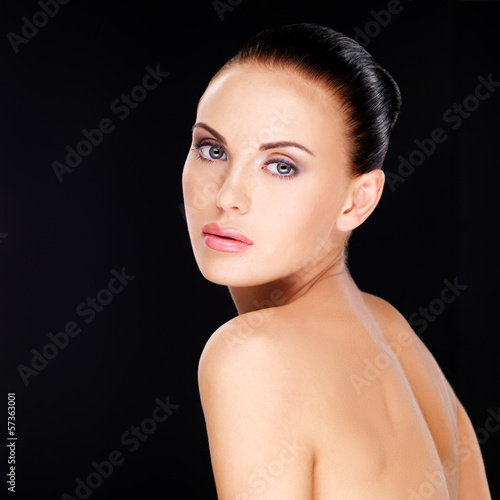 Photo: Beautiful face of the adult woman with fresh skin Beautiful face of the adult woman with fresh skin