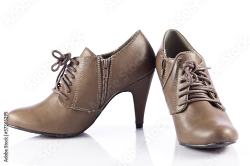 Photo: Woman shoes isolated on white. Nice woman shoes Woman shoes isolated on white. Nice woman shoes