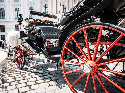 Photo: Traditional Fiaker carriage at Hofburg in Vienna, Austria Traditional Fiaker carriage at Hofburg in Vienna, Austria