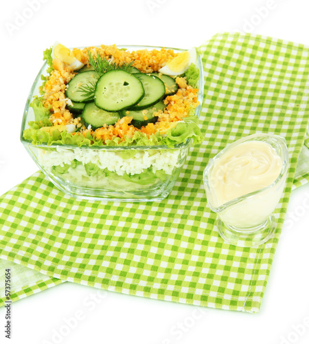 Photo: Delicious salad with eggs, cabbage and cucumbers, isolated Delicious salad with eggs, cabbage and cucumbers, isolated