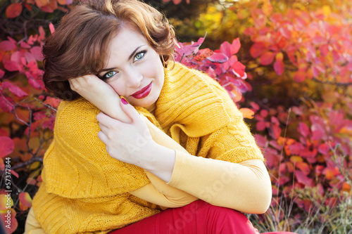 Photo: Pretty woman in autumn park Pretty woman in autumn park
