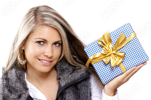Photo: Sexy young woman holding christmas present Sexy young woman holding christmas present