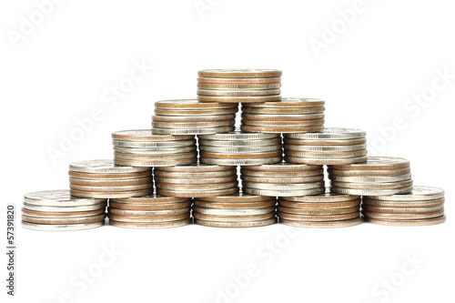 Photo: stacks of coins stacked in a pyramid on a white background stacks of coins stacked in a pyramid on a white background