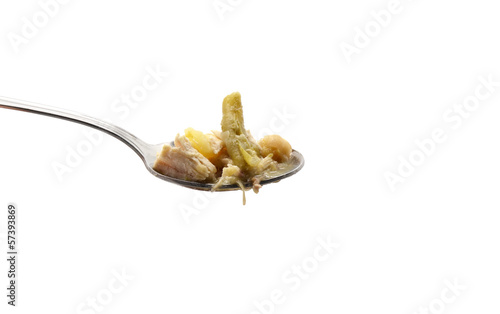 Photo: spoonful of stewed chickpeas with meat, beans and potatoes spoonful of stewed chickpeas with meat, beans and potatoes
