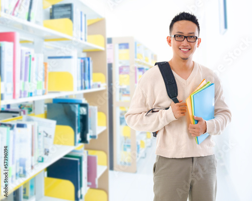 Photo: Southeast Asian adult student in library Southeast Asian adult student in library