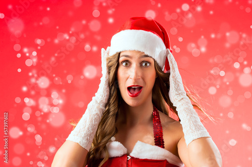 Photo: Santa Claus woman being surprised Santa Claus woman being surprised