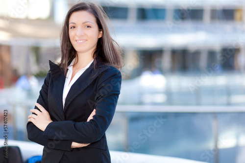 Photo: Smiling businesswoman outdoor Smiling businesswoman outdoor