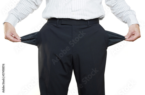 Photo: businessman hand showing empty pockets businessman hand showing empty pockets