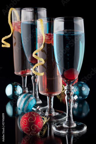 Photo: Blue and Pomegranate Champagne Cocktails Blue and Pomegranate Champagne Cocktails