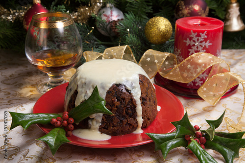 Photo: Christmas Pudding With White Sauce Christmas Pudding With White Sauce