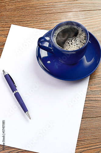 Photo: blue coffee cup on white blank blue coffee cup on white blank