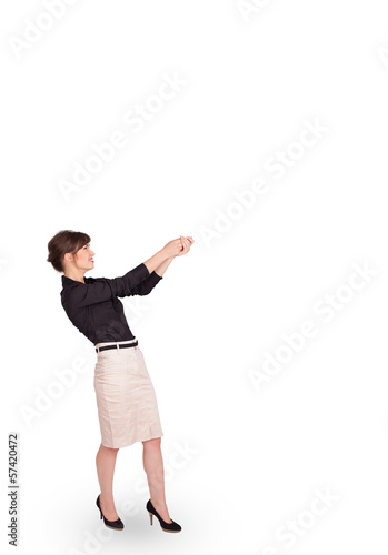 Photo: Young lady gesturing with copy space Young lady gesturing with copy space
