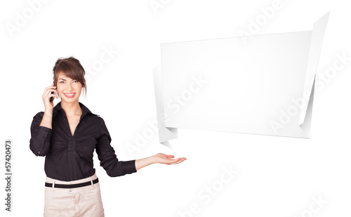 Photo: young woman presenting abstract origami copy space young woman presenting abstract origami copy space