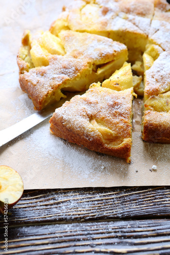 Photo: pieces of apple pie with icing sugar pieces of apple pie with icing sugar