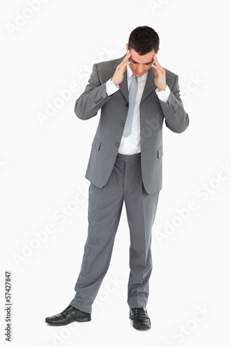 Photo: Businessman having a headache Businessman having a headache