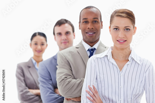 Photo: Close-up of colleagues in a single line crossing their arms Close-up of colleagues in a single line crossing their arms