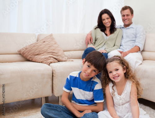 Photo: Happy family in the living room Happy family in the living room