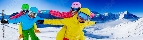 Photo: Ski, snow, sun and fun - family enjoying winter Ski, snow, sun and fun - family enjoying winter