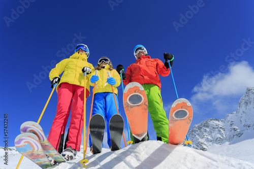 Photo: Ski, snow, sun and fun - family enjoying winter Ski, snow, sun and fun - family enjoying winter
