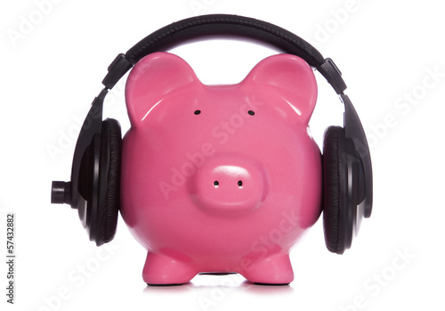 Photo: Piggy bank wearing headphones Piggy bank wearing headphones