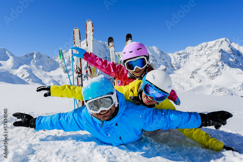Photo: Skiing, skiers, sun and fun - family enjoying winter Skiing, skiers, sun and fun - family enjoying winter