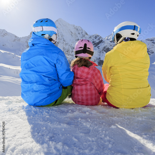 Photo: Ski, skiers, snow - family enjoying ski holiday Ski, skiers, snow - family enjoying ski holiday