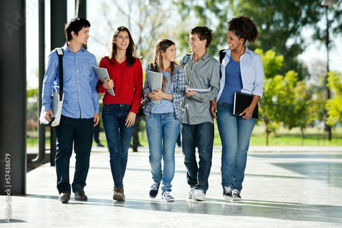 Photo: College Students Walking Together On Campus College Students Walking Together On Campus