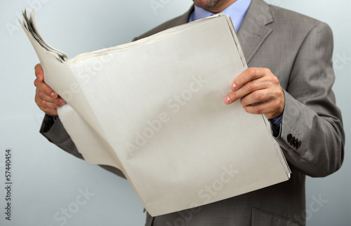 Photo: Reading the newspaper Reading the newspaper