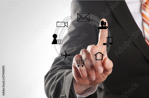 Photo: man with social media icons man with social media icons
