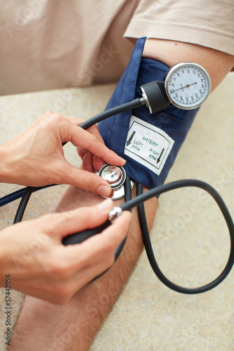 Photo: Blood pressure measuring. Blood pressure measuring.