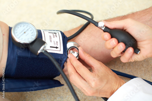 Photo: Blood pressure measuring. Blood pressure measuring.