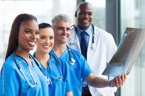 Photo: group of medical workers working together group of medical workers working together