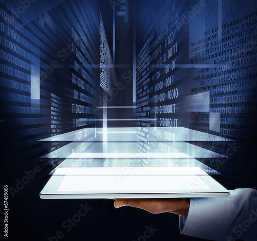 Photo: Woman hand with tablet computer. Woman hand with tablet computer.