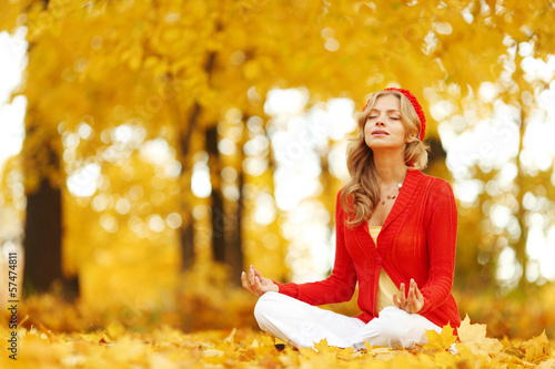 Photo: Autumn yoga woman Autumn yoga woman