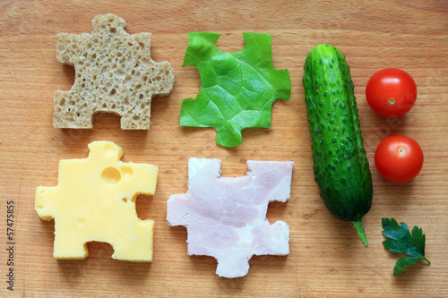 Photo: Food puzzle ingredients diet creative abstract concept Food puzzle ingredients diet creative abstract concept