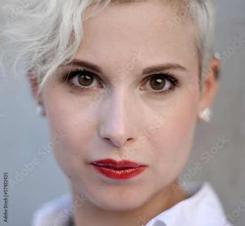 Photo: Girl with an intense View and red Lips Girl with an intense View and red Lips