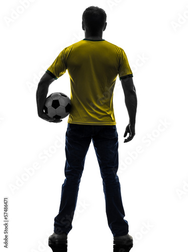 Photo: rear view back man holding soccer football silhouette rear view back man holding soccer football silhouette