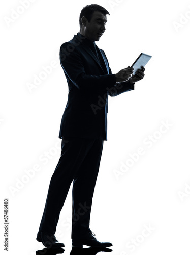 Photo: business man surprised digital tablet silhouette business man surprised digital tablet silhouette