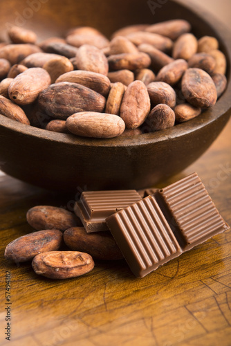 Photo: Cacao beans with milk chocolate Cacao beans with milk chocolate