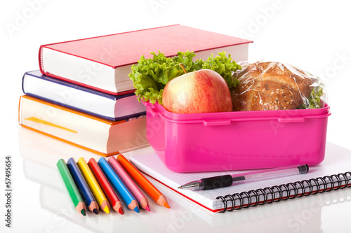 Photo: Lunch box and books Lunch box and books