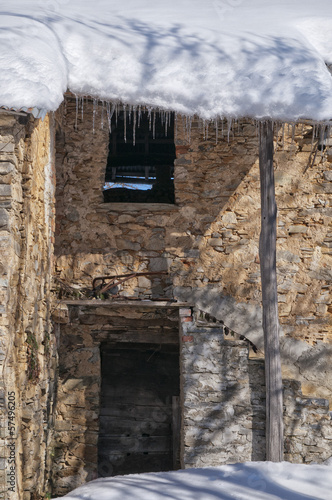 Photo: icicles on stone wall icicles on stone wall