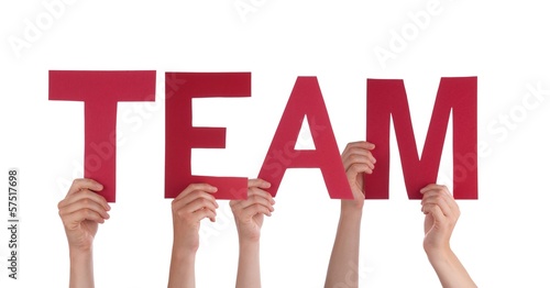 Photo: People Holding a Red Team People Holding a Red Team
