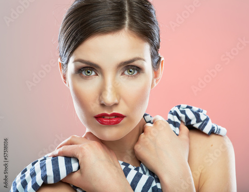 Photo: Close up face of young woman Close up face of young woman