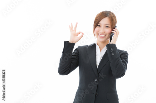 Photo: 電話をする女性 ビジネス 電話をする女性 ビジネス