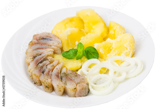 Photo: fish fillet with potatoes and onions fish fillet with potatoes and onions