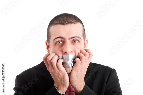 Photo: Portrait of a businessman having the mouth closed with tape Portrait of a businessman having the mouth closed with tape