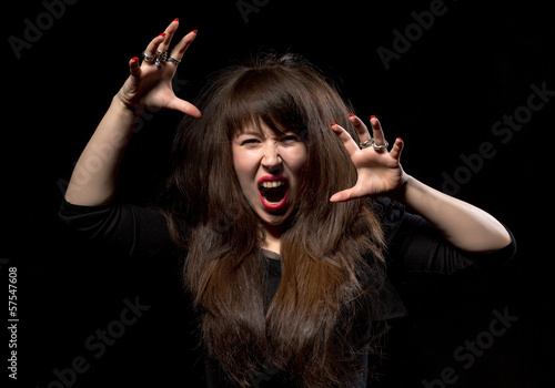 Photo: Woman throwing a temper tantrum Woman throwing a temper tantrum