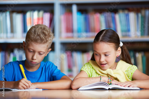 Photo: Classmates reading Classmates reading